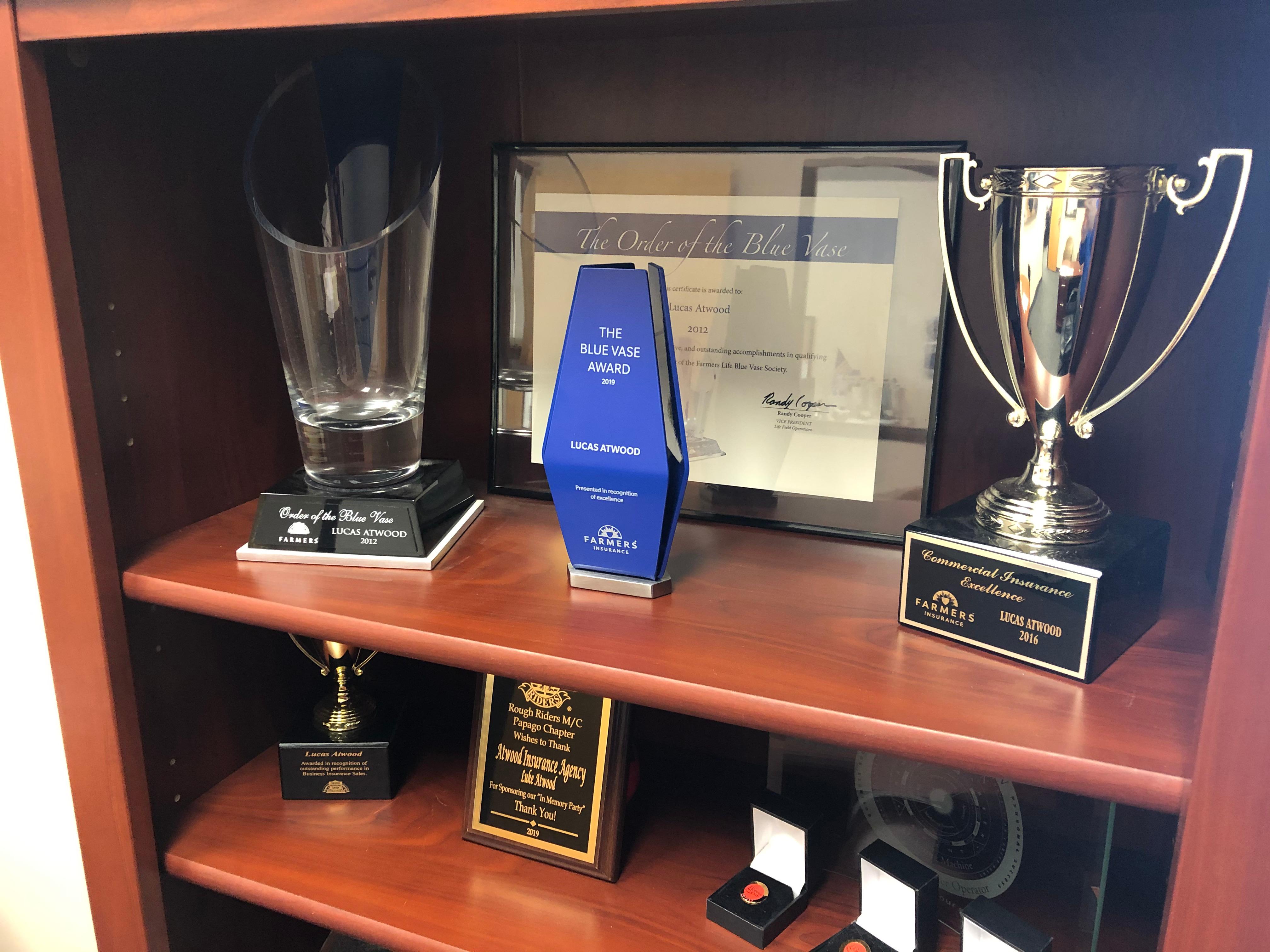 The Atwood Insurance Agency earned the Farmers Life Blue Vase award for the second time